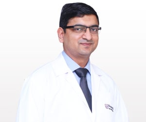 Dr Ankur G