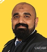 डॉ। आबिद एम