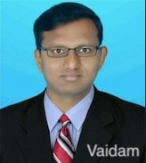 Dr. Satish L